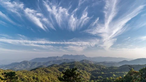 Timelapse of moving clouds with Doi Luang Chiang Dao seen in far distant Stock Footage 265391277