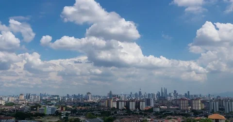 Timelapse of moving clouds in Kuala Lumpur, Malaysia Stock Footage 77201704