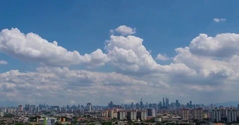Timelapse of moving clouds in Kuala Lumpur, Malaysia Stock Footage 77205690