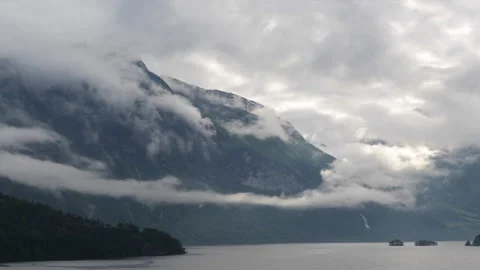 Timelapse of a moving clouds with a mountains view and fjord, Norway Stock Footage 132502561