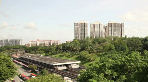 Timelapse moving clouds, MRT Train station, singapore housing flats Stock Footage 32694390