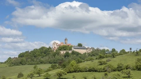 Timelapse - Moving clouds over Castle Ronneburg Video stock 108180366