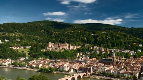 Timelapse - Moving clouds over the city of Heidelberg Видео 64999097