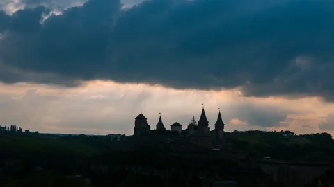 Timelapse of moving clouds over medieval castle Kamianets-Podilskyi Stock Footage 98804788