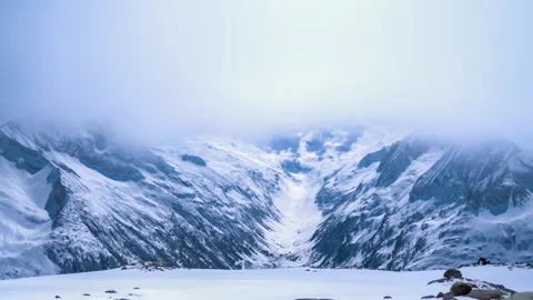 Timelapse of moving clouds over mountain with snow at hintertux glacier in .. Stock Footage 283552943