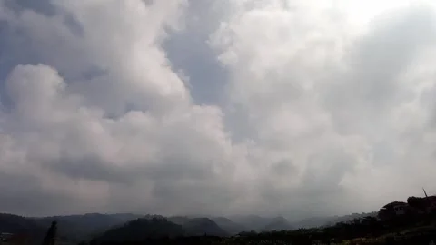Timelapse: moving clouds over the mountains Stock Footage 243693924