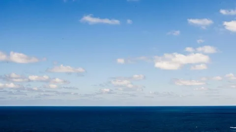 Timelapse of moving clouds over the sea Stock Footage 83655988