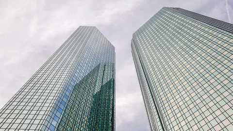 Timelapse of moving clouds over skyscrapers Vídeo Stock 120600026