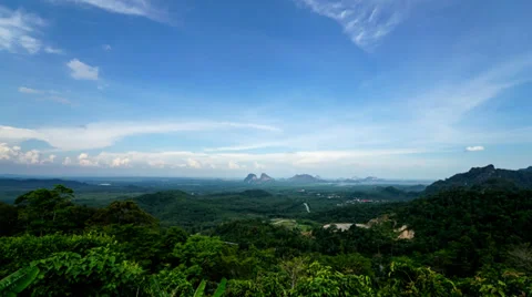 Timelapse Of Moving Clouds Over Wang Kelian Stock Footage 39521780
