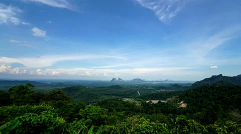 Timelapse Of Moving Clouds Over Wang Kelian Stock Footage 39521784