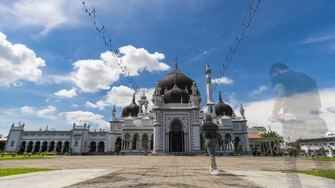 Timelapse of moving clouds over Zahir Mosque Stock Footage 120509946
