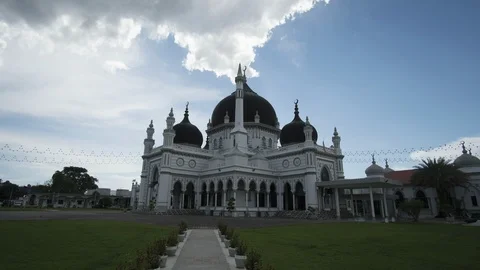 Timelapse of moving clouds over Zahir Mosque Stock Footage 120510555