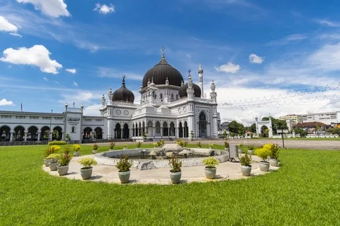 Timelapse of moving clouds over Zahir Mosque Stock Footage 120511052