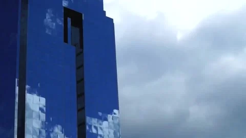 Timelapse Moving Clouds Reflection Into Glass Building Stock Footage 109147096