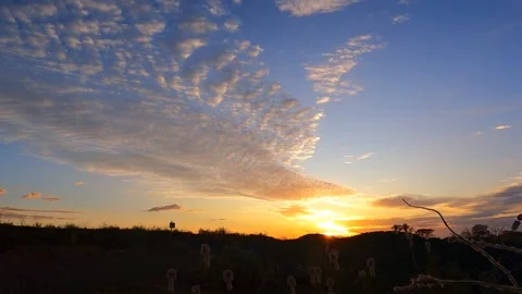 Timelapse Moving Clouds at Sunrise Stock Footage 228142420