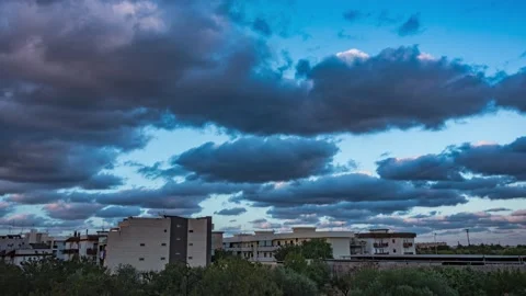 Timelapse moving clouds at sunset Stock Footage 141382208