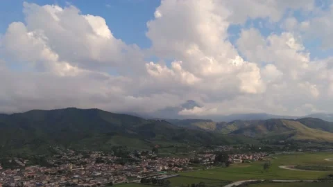 Timelapse moving clouds at sunset over the urban area of Urrao, Antioquia. Stock Footage 159687107