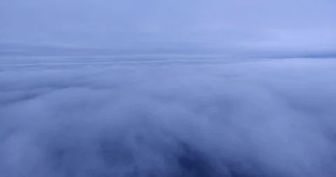 Timelapse of the moving drone through blue thick clouds. Travelling in the air Stock Footage 85899330