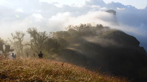 Timelapse of moving mist over the top of mountain on early morning Stock Footage 49319399
