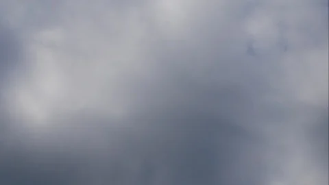 Timelapse moving rain cloud with blue sky background at day time Stock Footage 129241197