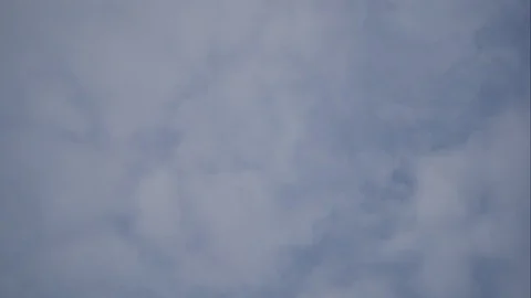 Timelapse moving rain cloud with blue sky background at day time Stock Footage 129929401