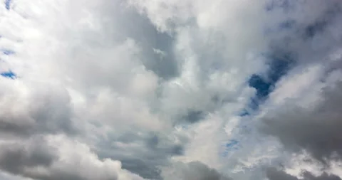 Timelapse of moving rolling puffy clouds. Flying through the clouds 4K Stock Footage 118289223