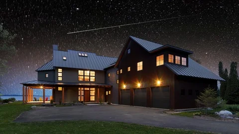 Timelapse of moving star trails in night sky. The Milky Way galaxy rotating Stock Footage 123182011