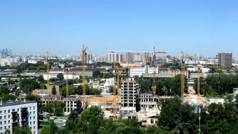 Timelapse of multistory apartment buildings assembling Video stock 205611089