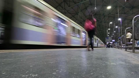 Timelapse of Mumbai Local Train Arriving at Churchgate Station Platform at Night Stock Footage 150921429