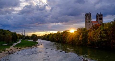 Timelapse of Munich at dramatic sunset: autumn in park of famous tourist Stock Footage 122464222