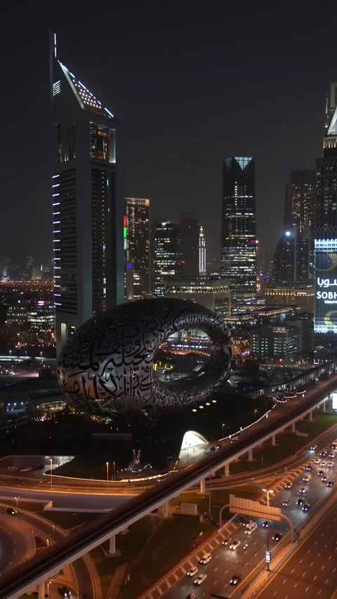 Timelapse on the Museum of the Future building with Sheikh Zayed Road. At night Stock Footage 239066497