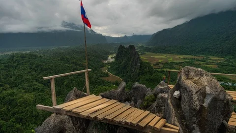 Timelapse Nam Xay view point with wood costrucion and Lao Flag Stock Footage 112166648