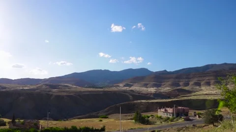 TIMELAPSE Nature Environment WITH THE MOTION OF CLOUDS IN MOUNTAINS Stock Footage 130854597