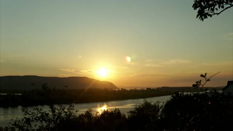 Timelapse of nature. The river against the background of the setting sun. 4k Stock Footage 157074155