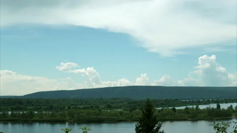 Timelapse of nature. The river against the background of moving clouds. 4k Stock Footage 157074238
