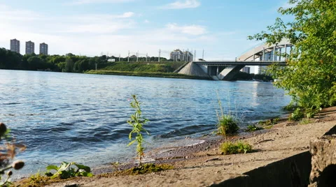 Timelapse Navigable River With a Lot of Ship Traffic, Trains go Over the Stock Footage 64924032