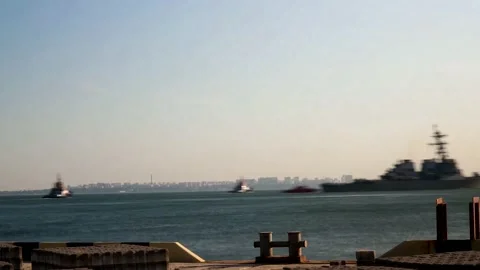 Timelapse of Navy ships passing Stock Footage 131888805