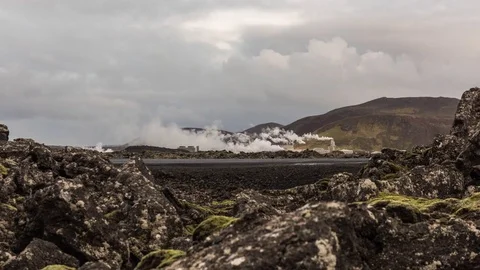 Timelapse near Blue Lagoon on a cloudy day with mist and moss covered landscape Stock Footage 83705589