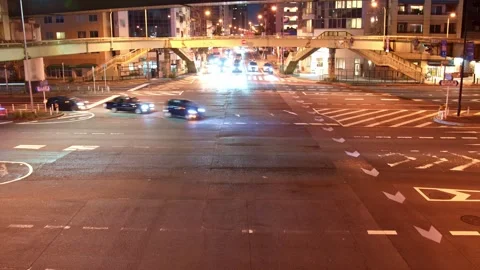 Timelapse of night crossroad of offce district in Japan - 4k Stock Footage 323574735