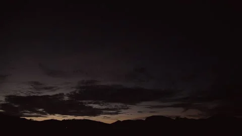 Timelapse Night To Day Of Clouds. The First Rays Of Colorful Red Sunrise At Dawn Video stock 152582210