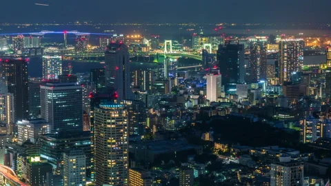 Timelapse of Night to Day Transition of Congested Cityscape in Tokyo -Pan Left- Stock Footage 86189724
