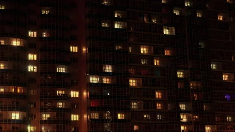 Timelapse of the night facade of building with a lot of windows. Stock Footage 88980797