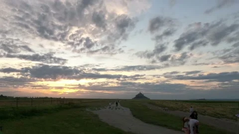 Timelapse of night falling in the mont saint michel Stock Footage 166234401