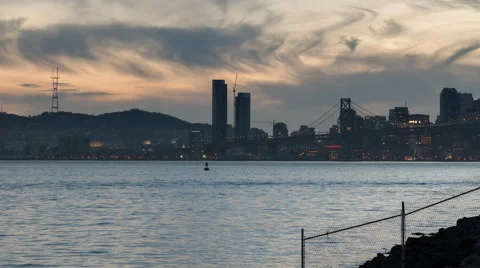 Timelapse night falling over San Francisco as seen from the Port of Oakland Stock Footage 47458896