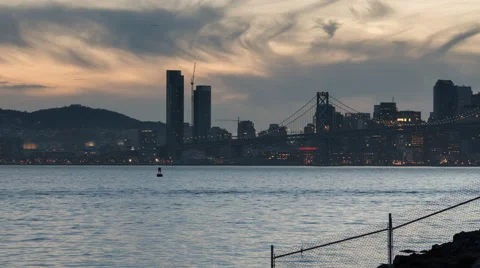 Timelapse night falling over San Francisco as seen from the Port of Oakland Stock Footage 47459957