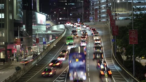 Timelapse of night highway of offce district in Hong Kong - 4k Stock Footage 285900945