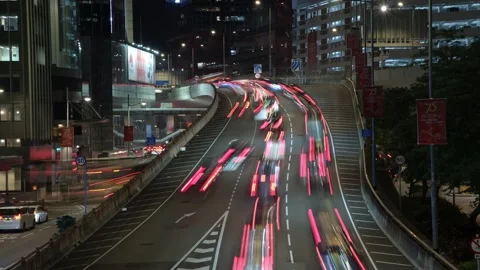 Timelapse of night highway of offce district in Hong Kong - 4k Stock Footage 285903245