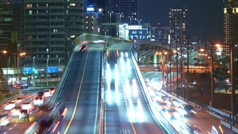 Timelapse of night highway of offce district in Japan - 4k Stock Footage 323574729