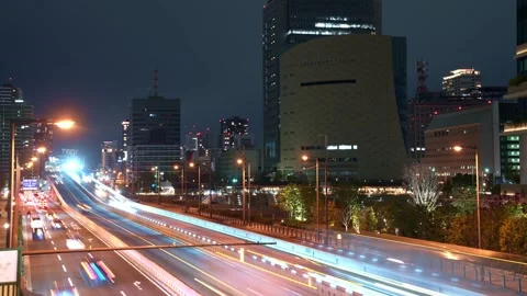 Timelapse of night highway of offce district in Japan - 4k Stock Footage 323574732
