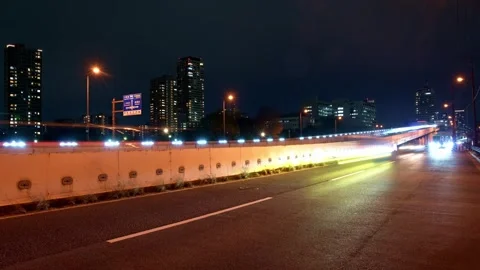 Timelapse of night highway of offce district in Japan - 4k Stock Footage 323574733
